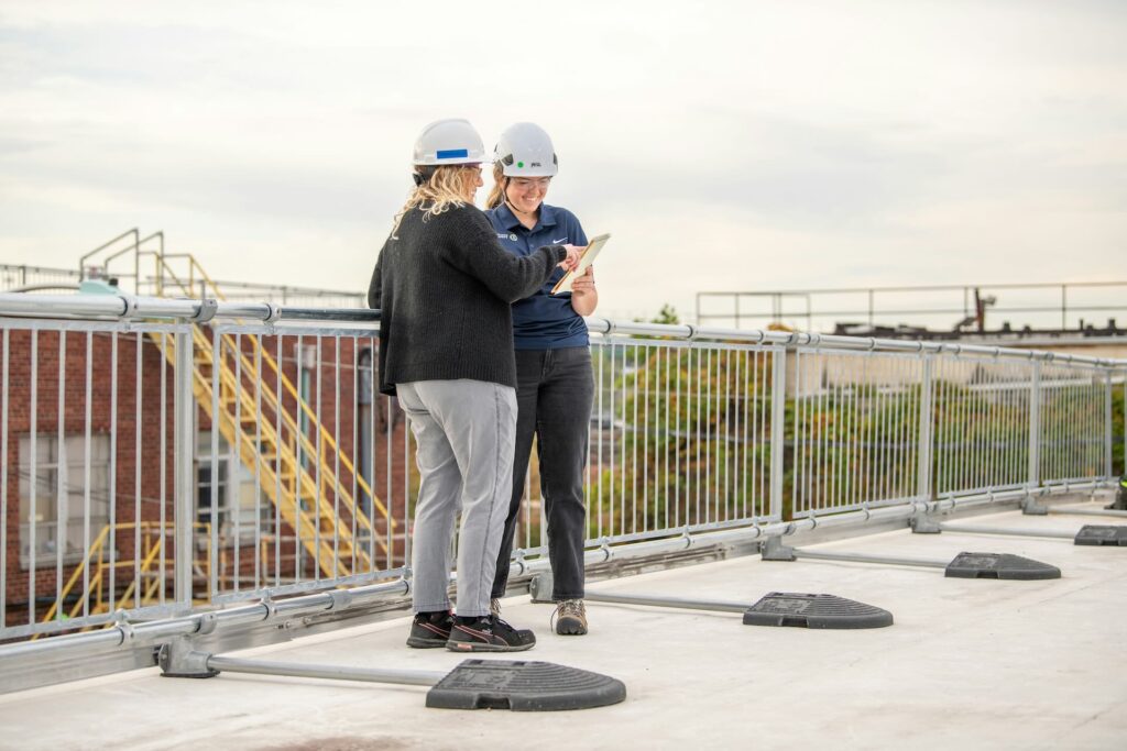 Santa Barbara homeowner reviewing ADU permit documents with an inspector