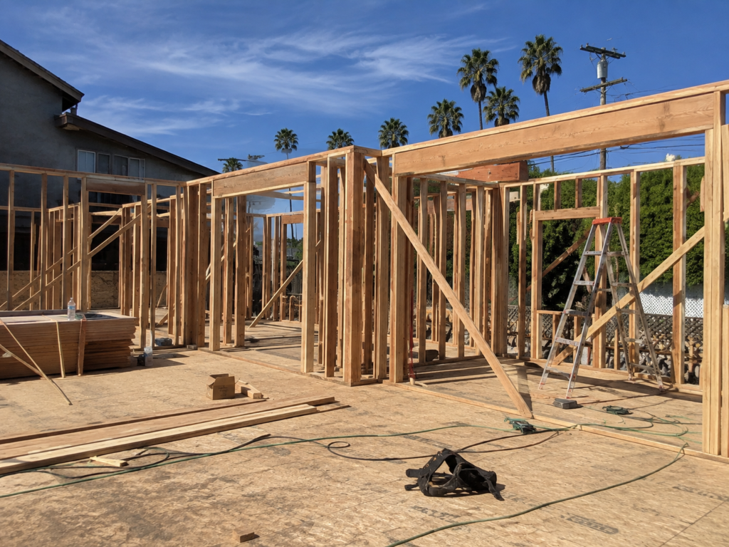 Framing stage construction after completing the permitting process in Santa Barbara